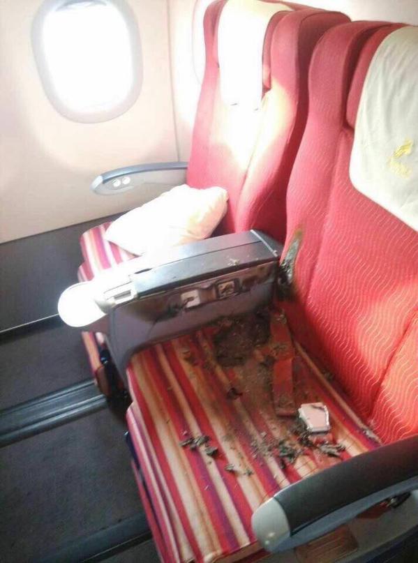 seat where passenger tried to light fire on aircraft shenzhen airways